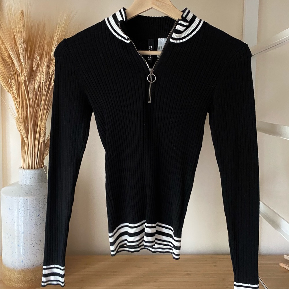 Black ribbed long sleeve shirt, half zip up